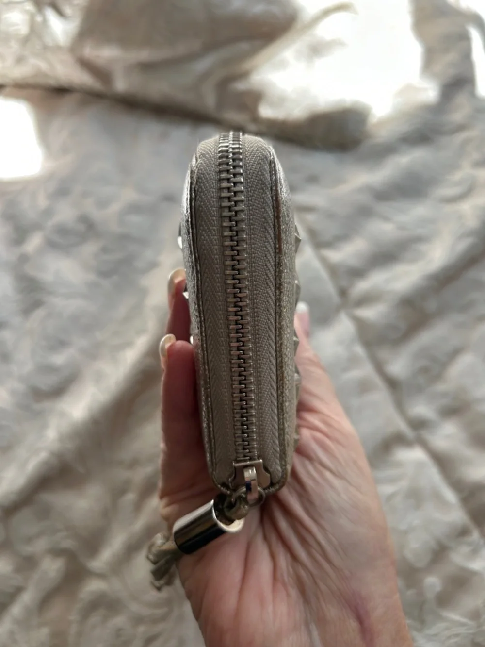 7021. Jimmy Choo Filipa Metallic Silver Star-Embellished Zip Around Wallet
